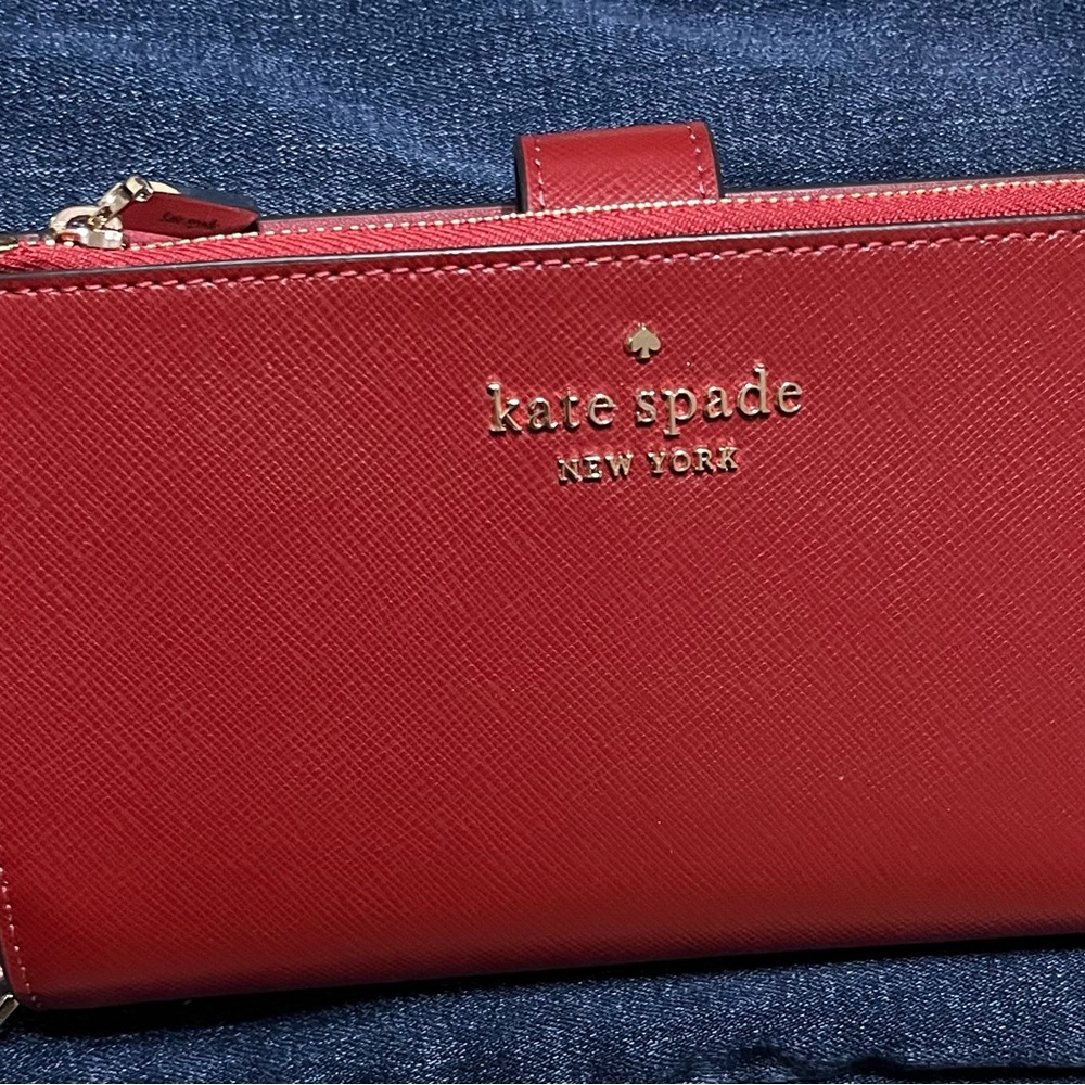 Kate Spade wristlet/ wallet. Never used. Brand new.